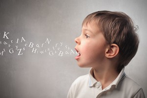 bigstock-Child-speaking-and-alphabet-s